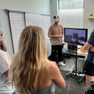 FGCU students are shown an interactive VR display of crop field applications.