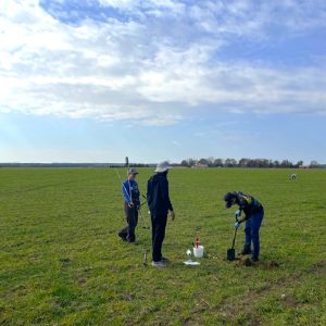 Team members collecting soil samples in North Florida.